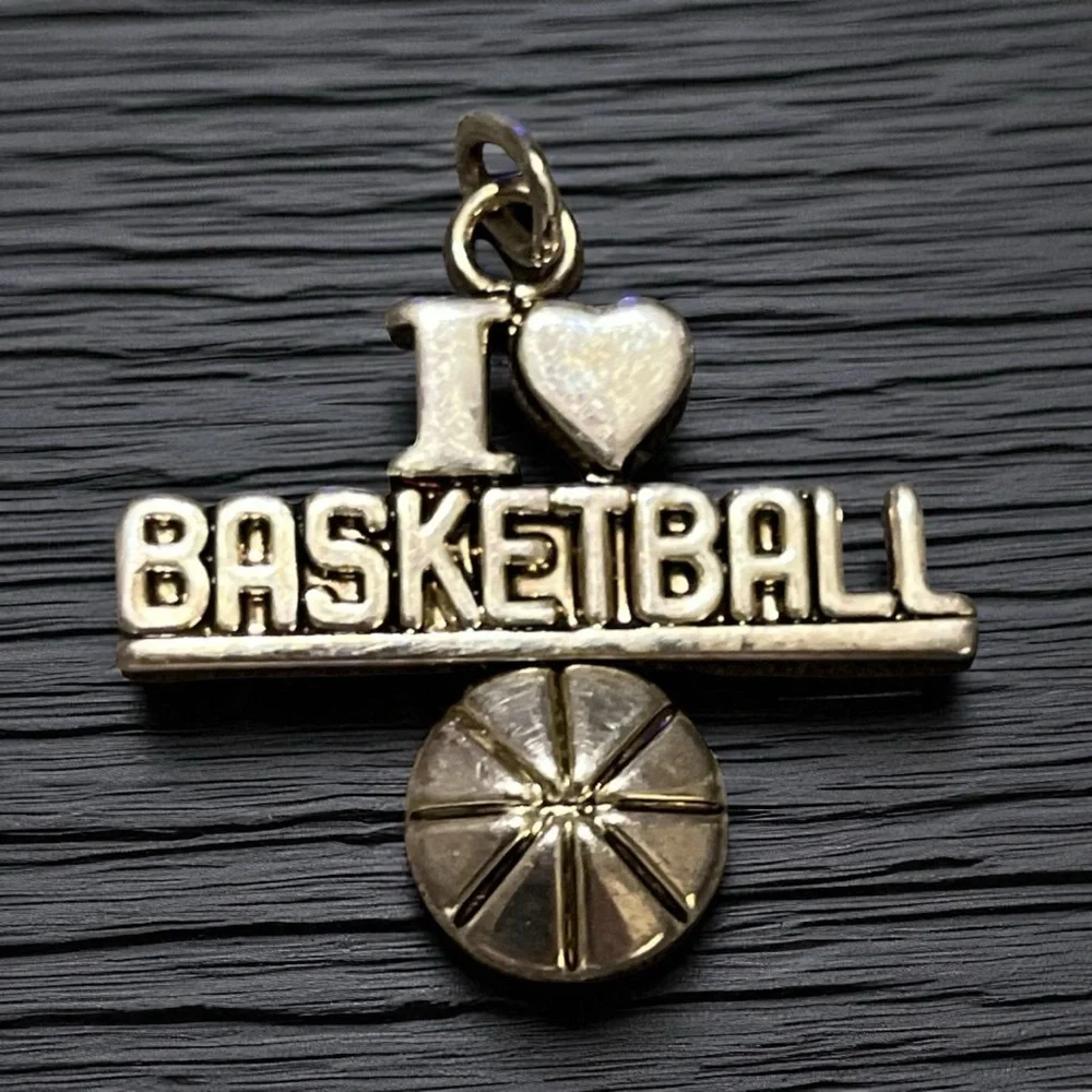 Silver Basketball Pendant Signed “Best”